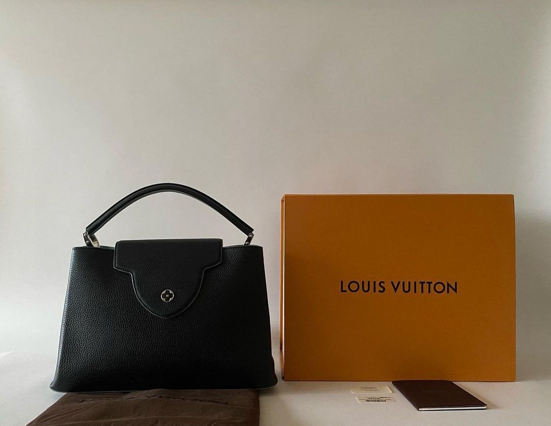 Louis Vuitton x Fornasetti Capucines MM Black and Gold Faded Portrait,  Luxury, Bags & Wallets on Carousell