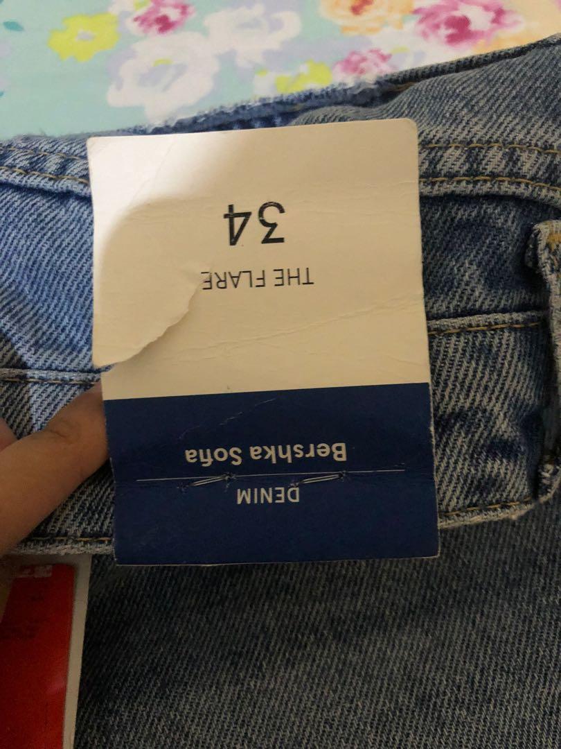 NEW BERSHKA FLARED RIPPED JEANS, Fesyen 