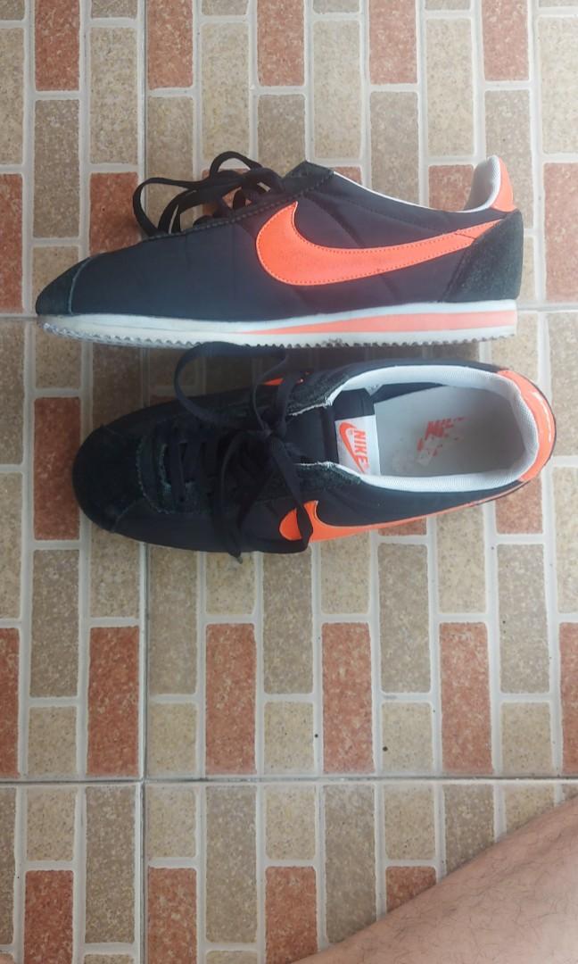 Nike cortez discount orange swoosh