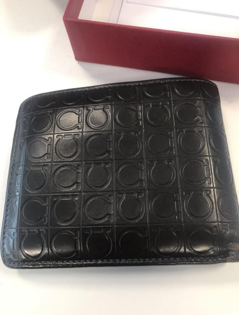 💯% Authentic Salvatore Ferragamo Men's Wallet (Category: Luxury Bags & Wallets) located in Manila. Submitted by redelicious (Listing ID 1110333987, Image 3). Description: 💯% Salvatore Ferragamo Wallet Men's authentic wallet Used but in very good condition 9/10 Original price: SGD 470 Comes with box, authenticity card, and original price tag Box has serial number that you can use to verify its authenticity Reasonable price for such high end bran