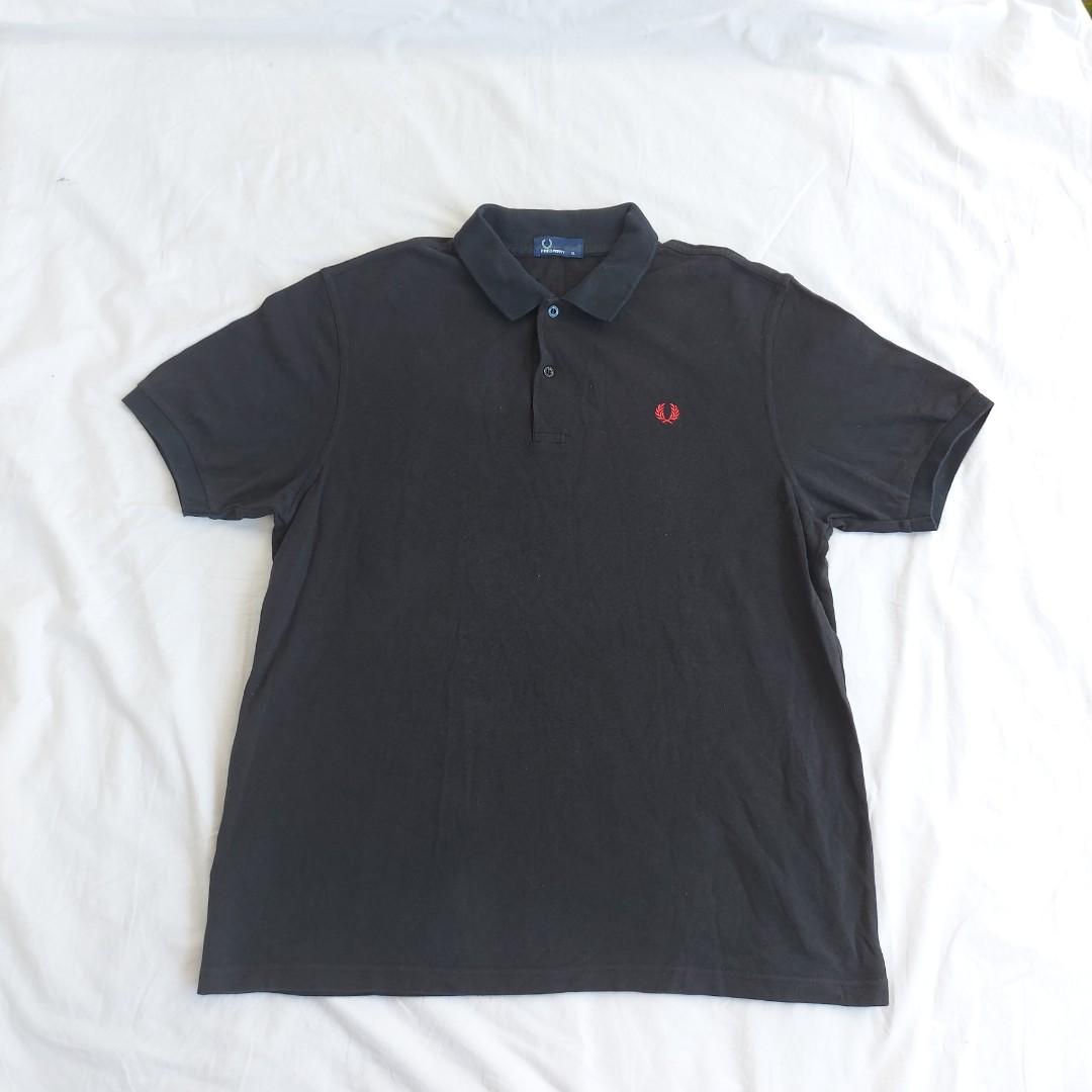 blue polo shirt with red horse