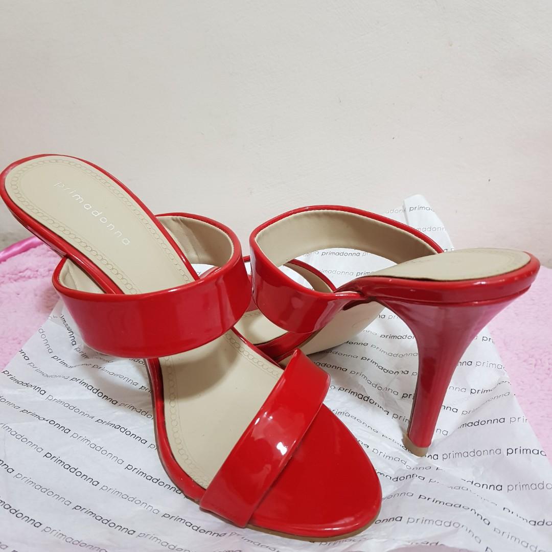 High Heels PRIMADONA (Category: Heels) located in Manila. Submitted by geecollection01 (Listing ID 1110299622, Image 1). Description: 💯 BRANDNEW Not used 2 Strap High Heels 4" heels Size 39 Red in Color.