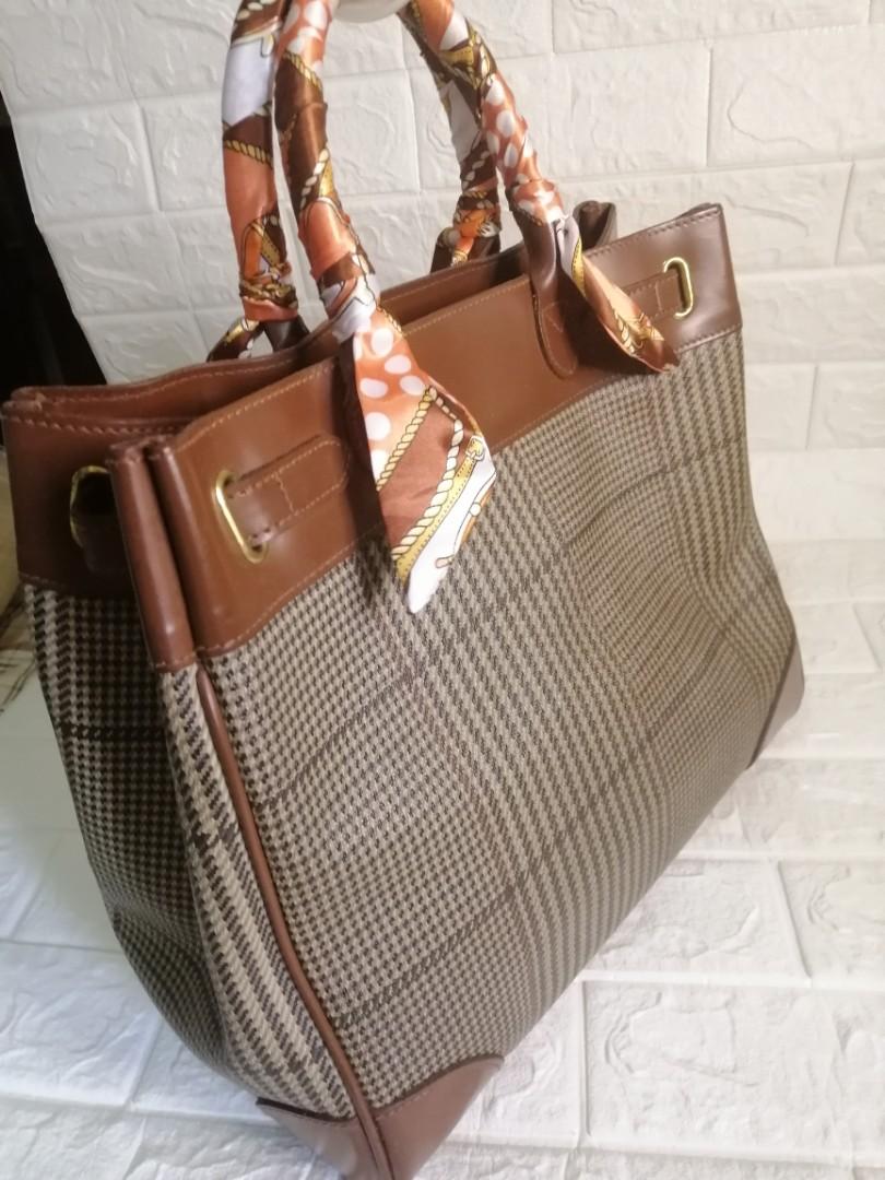 Polo Ralph Lauren RL Handbag (Category: Luxury Bags & Wallets) located in Las Pinas. Submitted by etoksi1234 (Listing ID 1110183852, Image 2). Description: Pre-loved Polo Ralph Lauren RL Handbag... Looks new... Brass hardware... Last pic for reference only... Size: L-13.5" x H-12" x D-6.5" Please manage your expectations. All sales are final. Kindly examine pictures carefully when buying online. No return, exchange policy....