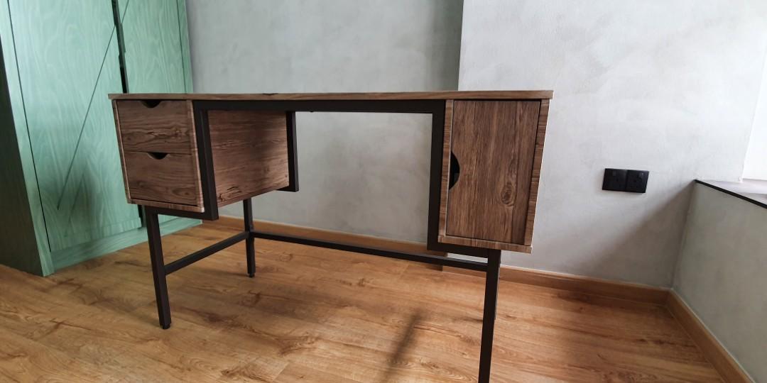 Study table. (Category: Tables & Sets) located in Singapore. Submitted by collectorgotham (Listing ID 1110354955, Image 2). Description: Height 76.5 cm X length 120 cm X width 48 cm beautiful wood grain laminated table light scratches on top ( refer to pic please) seldom use so selling.