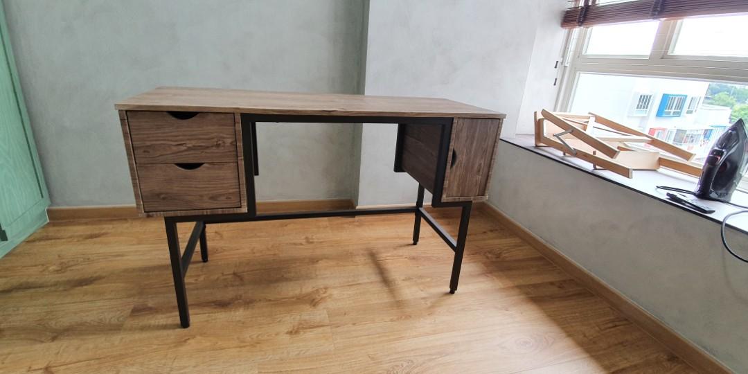 Study table. (Category: Tables & Sets) located in Singapore. Submitted by collectorgotham (Listing ID 1110354955, Image 1). Description: Height 76.5 cm X length 120 cm X width 48 cm beautiful wood grain laminated table light scratches on top ( refer to pic please) seldom use so selling.