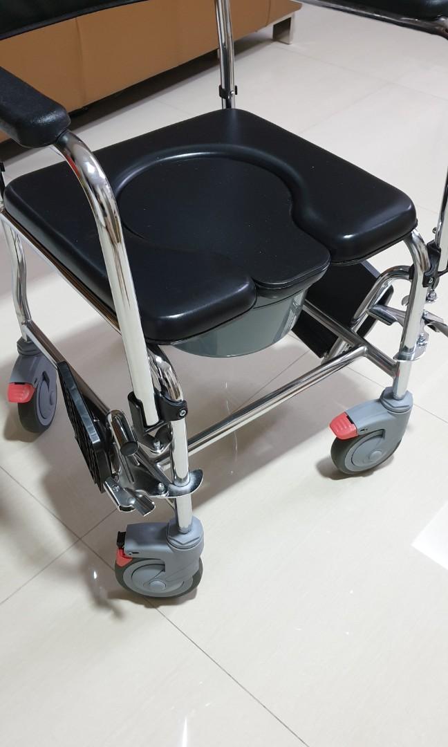 Commode (Category: Rehabilitative Devices) located in Singapore. Submitted by j.clk (Listing ID 1104877487, Image 3). Description: ￼ * Shower Chair * Commode Chair * Indoor Wheelchair * Polished Chrome Lightweight Frame * Detachable Bucket * Flip Up Arm Rest * Detachable Foot Rest * 4 Wheels Lock * less than 2 months old.