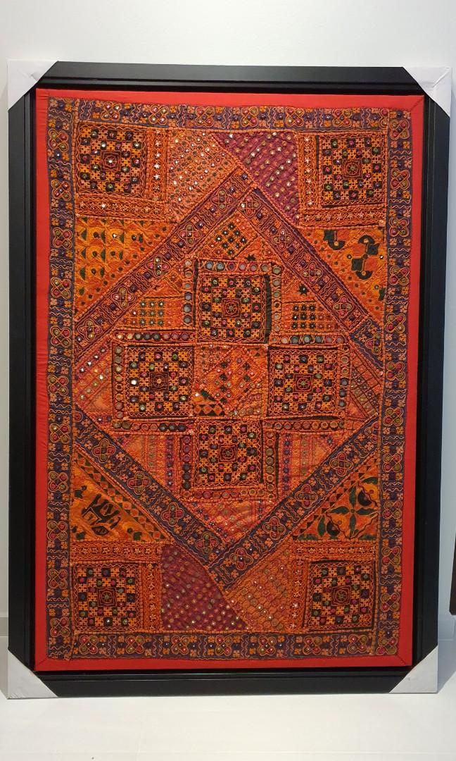 Fabric Decor (Category: Wall Decor) located in Singapore. Submitted by wilderness (Listing ID 1104922607, Image 1). Description: Letting go of this unique piece - the fabric was purchased at a shop in Holland V many years back. It cost us an arm and a leg but we loved it for the color and details. The red border was lovingly handstitched on. The frame was later added during our time overseas but we have not displayed it since we moved a number of