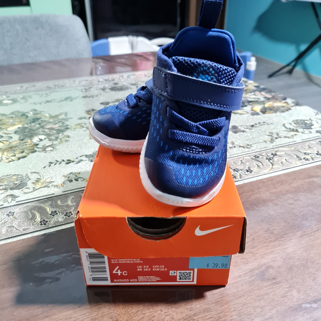 childrens blue nike trainers