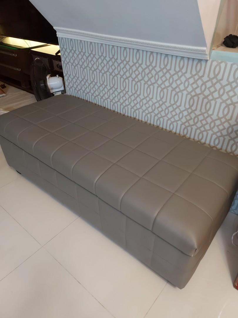Ottoman storage (Category: Sofas) located in Cainta. Submitted by houseofseconds (Listing ID 1110601885, Image 2). Description: Customized ottoman with storage size in inches 54x 23x17.Leather material in gray.newly upholstered with uratex foam.Can fit 6 regular sized pillow and blankets.excellent condition.