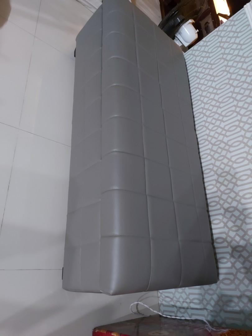 Ottoman storage (Category: Sofas) located in Cainta. Submitted by houseofseconds (Listing ID 1110601885, Image 1). Description: Customized ottoman with storage size in inches 54x 23x17.Leather material in gray.newly upholstered with uratex foam.Can fit 6 regular sized pillow and blankets.excellent condition.