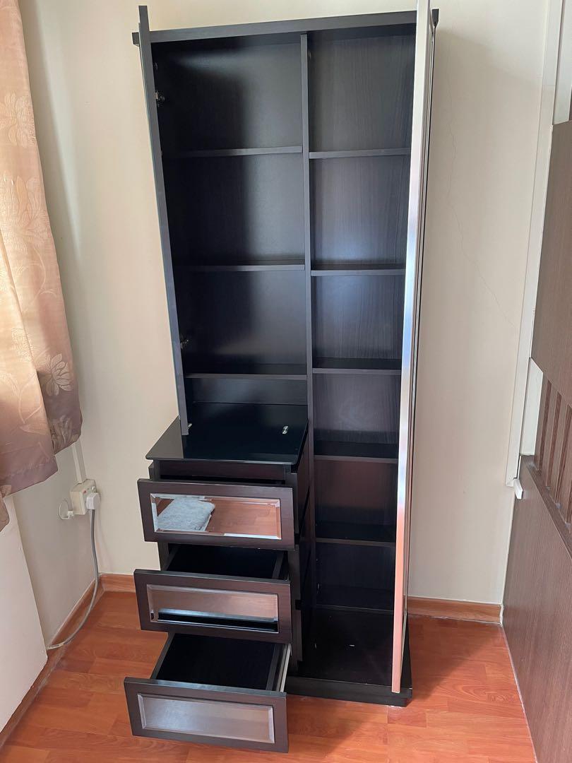 Dressing Table (Category: Shelves, Cabinets & Racks) located in Singapore. Submitted by blessed711 (Listing ID 1110659331, Image 2). Description: Well-kept good quality compact dresser/dressing table with 2 mirrors, 1 full-length. 3 smooth pull out drawers and many sturdy shelves. Cleaned and sanitised. Overall Dimensions in cm: Right side: 175(h)x70.5(w)x12(d) Left side top (excluding open area): 88(h)x 39(w) 3 drawer section: 76(h) x40(d)x39(w)