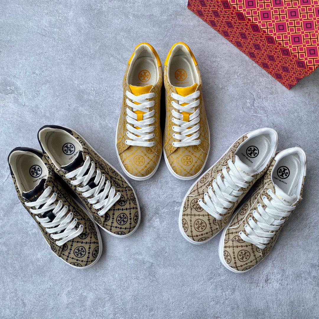 Tory burch gold discount sneakers