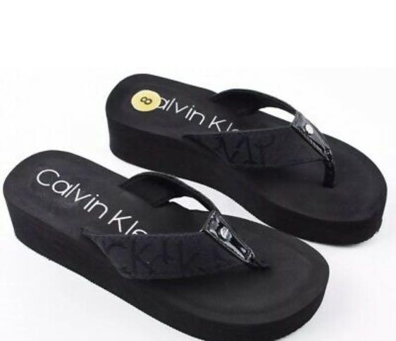 Calvin Klein Thong Sandals Mulan Platform Wedge Black, Women's Fashion,  Footwear, Wedges on Carousell