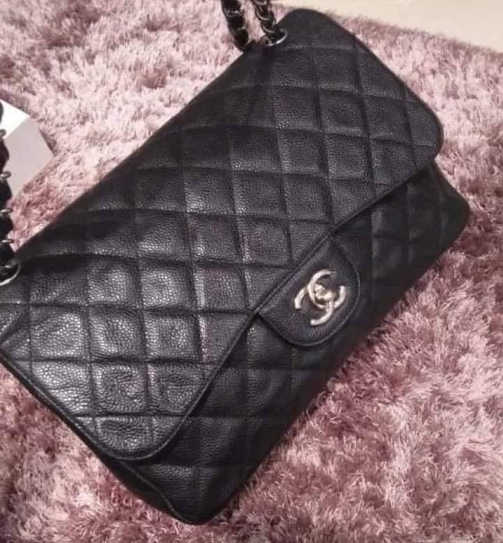 Chanel Jumbo Double Flap (Category: Luxury Bags & Wallets) located in Manila. Submitted by bagislifeshop (Listing ID 1104955894, Image 1). Description: ▪️CHANEL Jumbo Double Flap▪️ ☑️Available in Manila ✅💯% authentic ✅ Series: 14 ✅Condition: 8.5/10 ✅Material: black caviar leather and SHW ✅Inclusions: dustbag, authenticity card and hologram sticker..