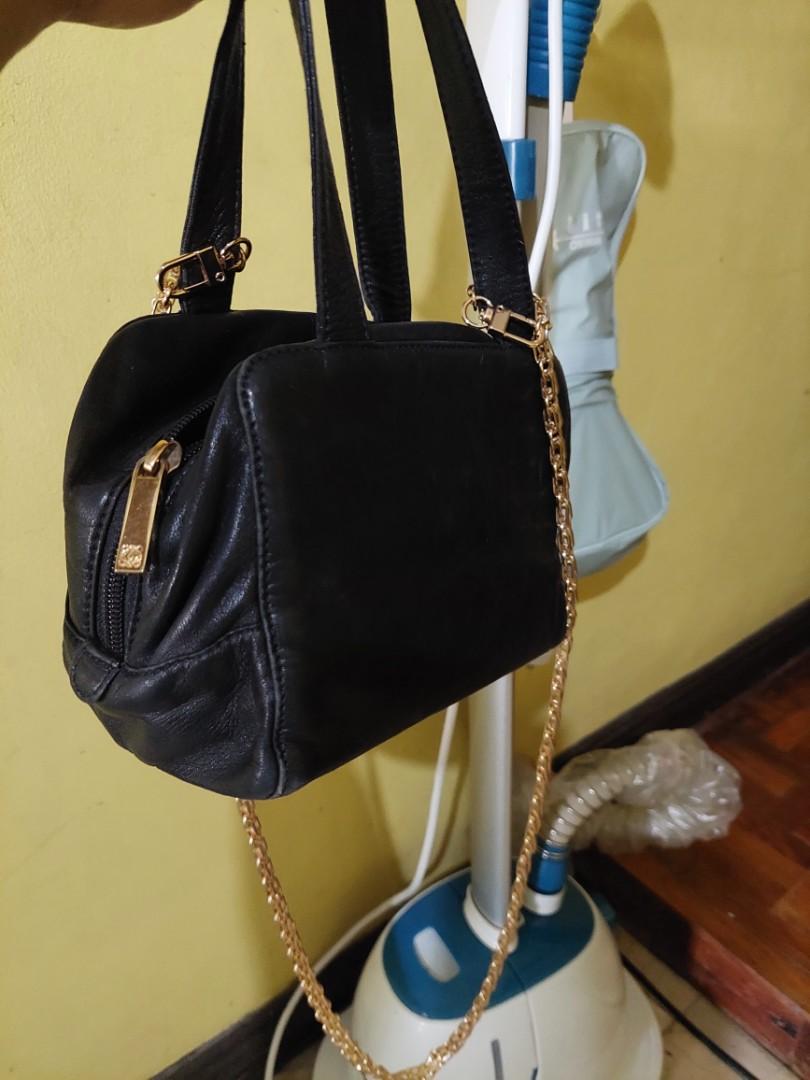 Loewe vanity/cosmetic bag (Category: Luxury Bags & Wallets) located in Manila. Submitted by aabila (Listing ID 1104987452, Image 3). Description: Authentic black buttery soft genuine leather , a trademark of loewe. Bag only. Serial code part has been broken (refer to pic) . Will include the chain sling..