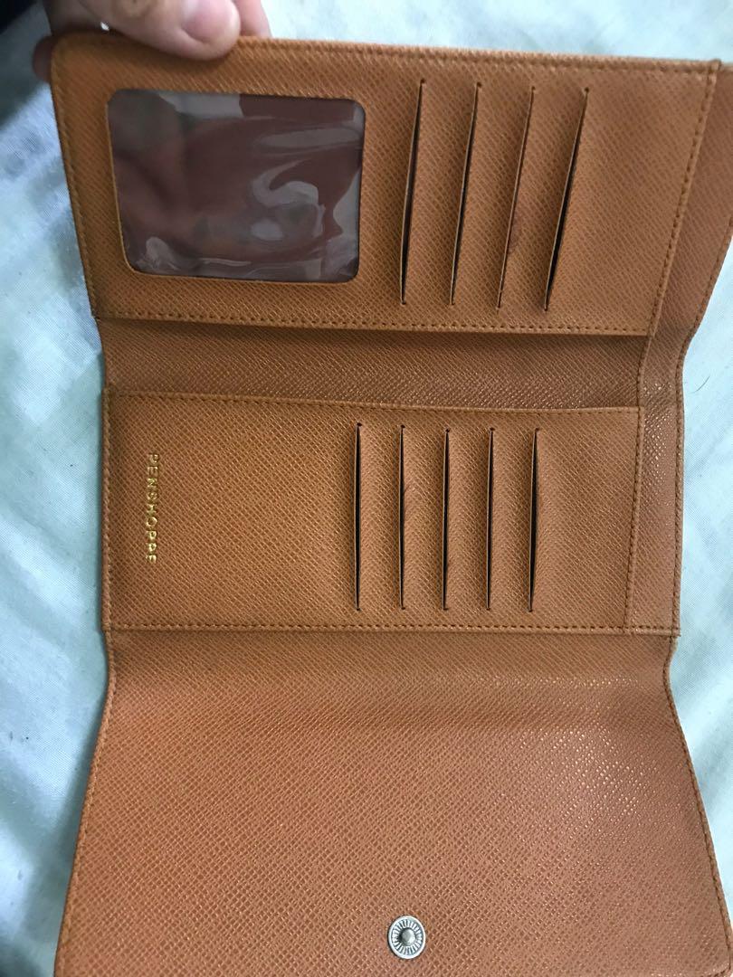 Never used. Naitago lang. (Category: Wallets & Card holders) located in Quezon City. Submitted by kyrania_declutter (Listing ID 1104991702, Image 2). Description: Penshoppe new wallet and card holder..
