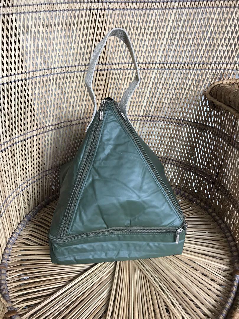 SALE: Foldable Triangle Bag (Category: Tote Bags) located in Bulacan. Submitted by orange.locker (Listing ID 1104999963, Image 2). Description: Triangle Bag Zipper works/ ykk Hardboard base canvas handle Very nice Unique design Foldable Spacious 11 inches base length 12 inches height.