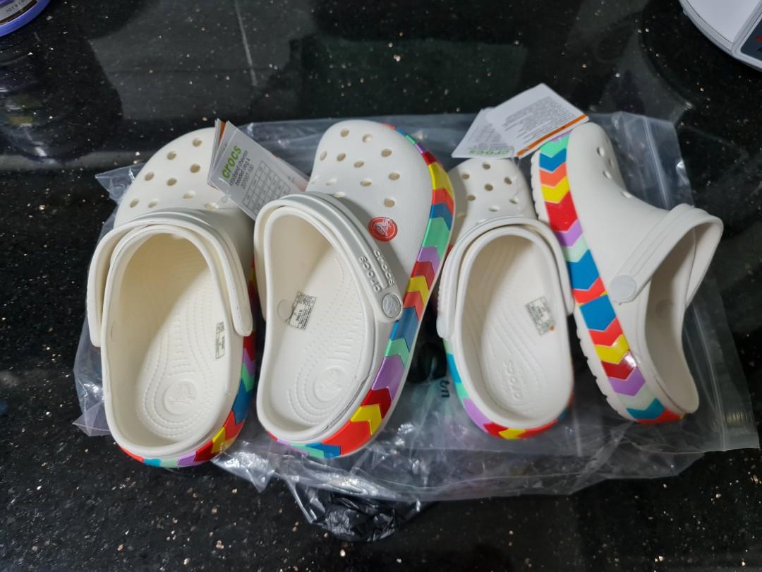 White crocs with rainbow stripe deals