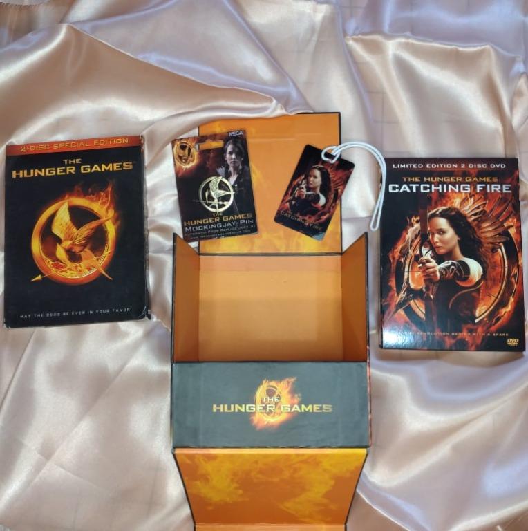 THE COMPLETE HUNGER GAMES BOX SET DVDS AND MERCH, Hobbies & Toys, Books