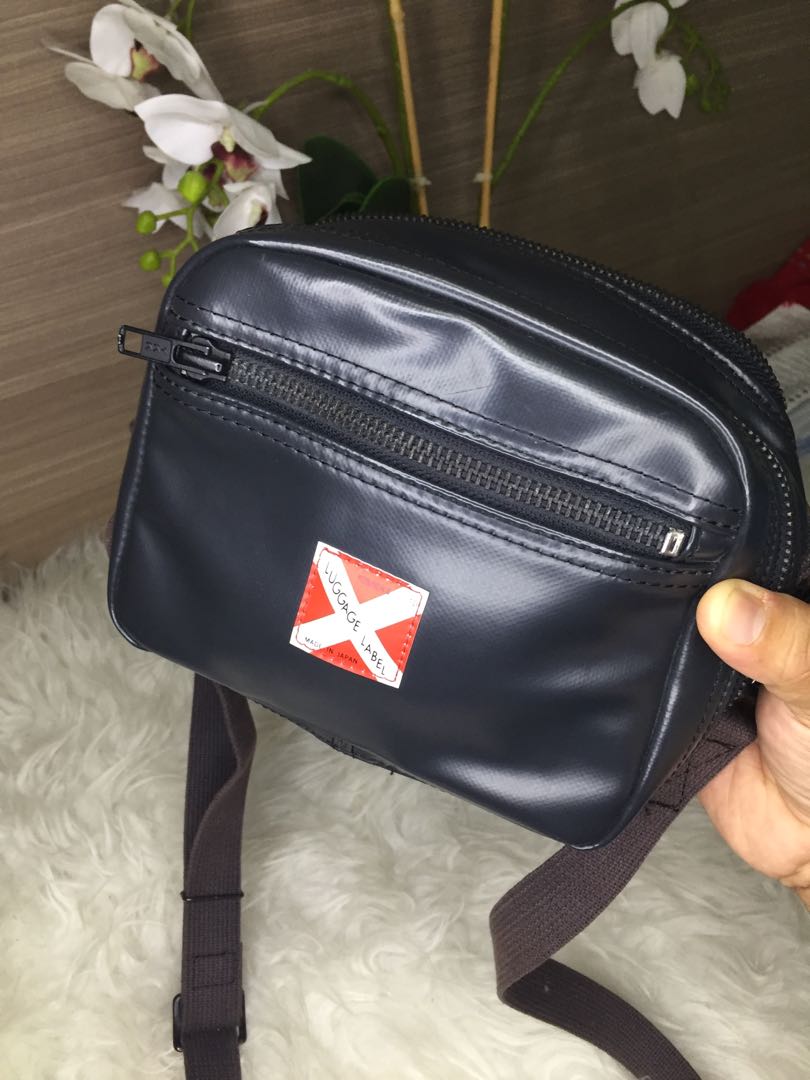 Luggage label sling bag sales