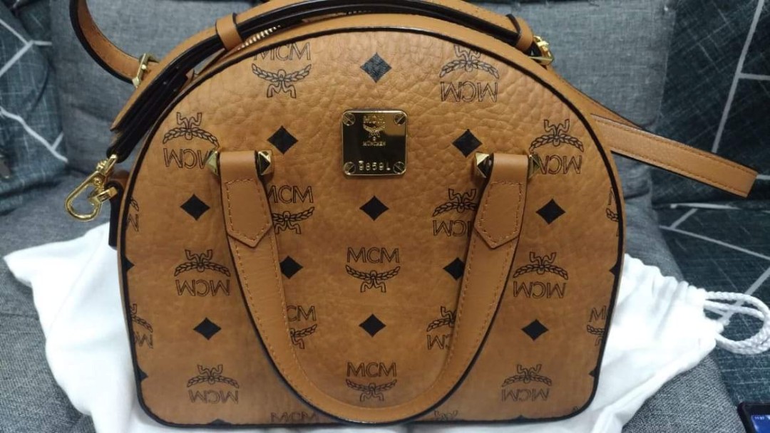 Mcm half moon bag clearance