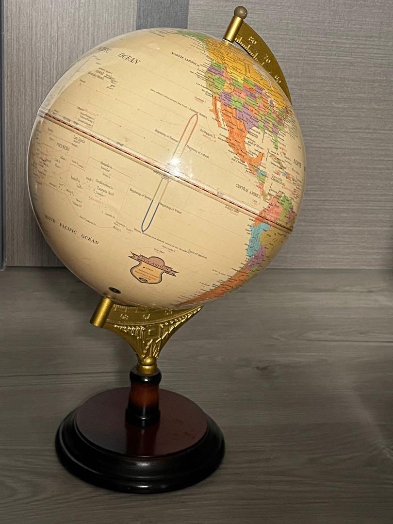 Antique-style world globe with stand