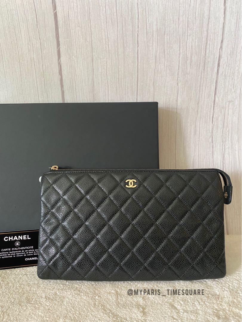Chanel Black Grained Quited Leather Mini Ocase Zip Pouch, Luxury, Bags &  Wallets on Carousell