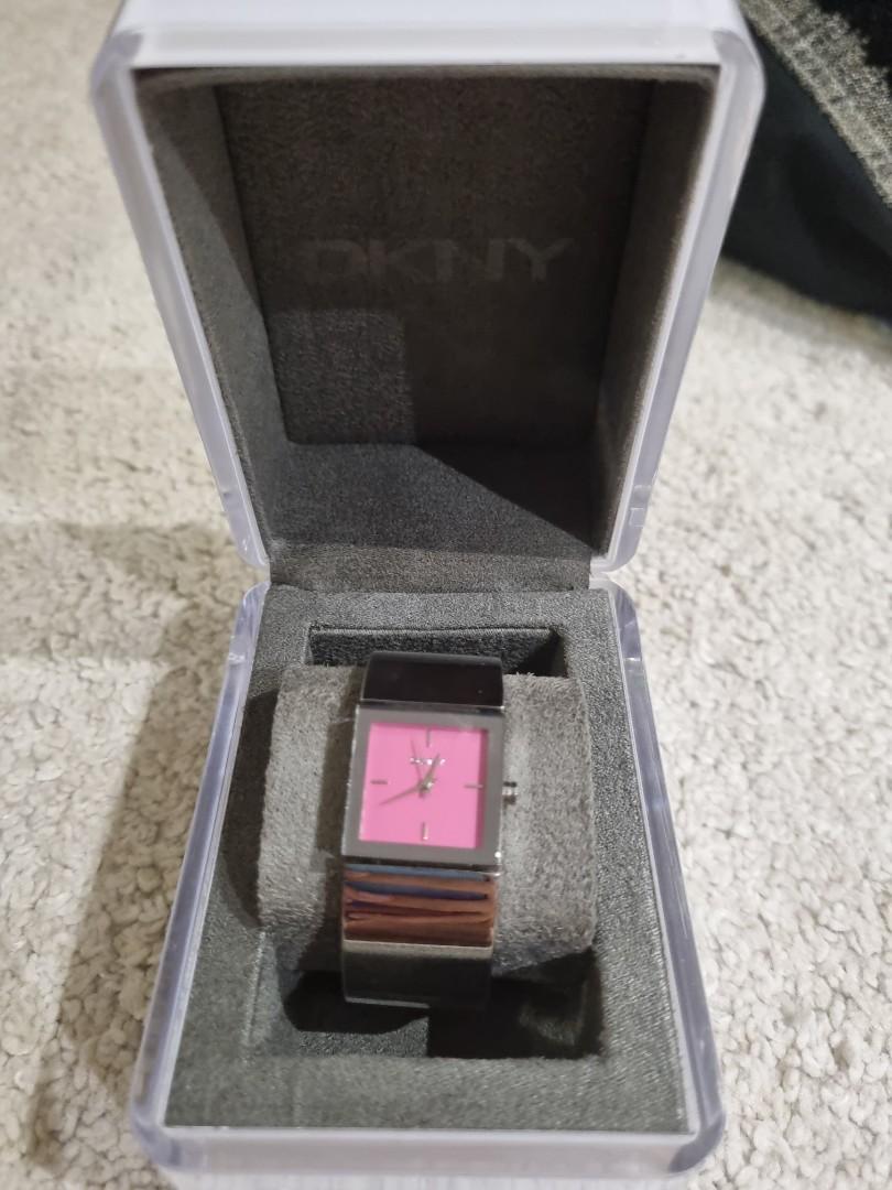 DKNY Bangle Watch (Category: Women's Watches) located in Singapore. Submitted by craftysummer_ (Listing ID 1105673721, Image 1). Description: Minor scratches on watch Comes in original box Comes with additional pieces for adjustment of size.