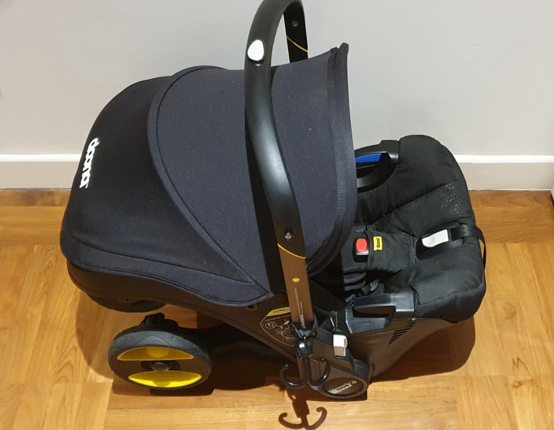 Doona + stroller / car seat with newborn inserts, Babies & Kids, Going