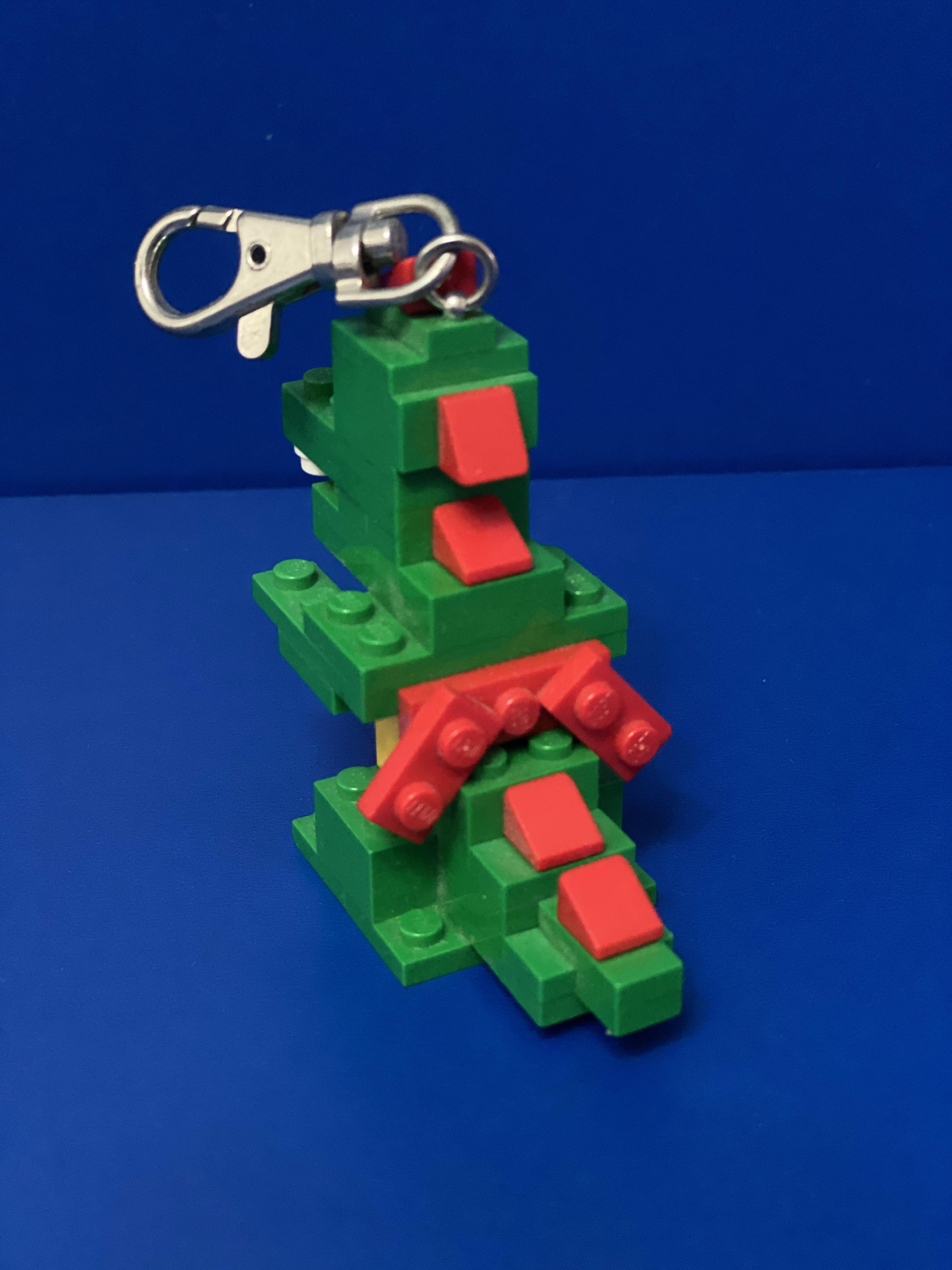 Lego top dinosaur keychain