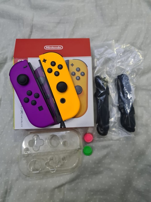 Nintendo Switch Joycon L R Neon Purple Orange Video Gaming Gaming Accessories Controllers On Carousell