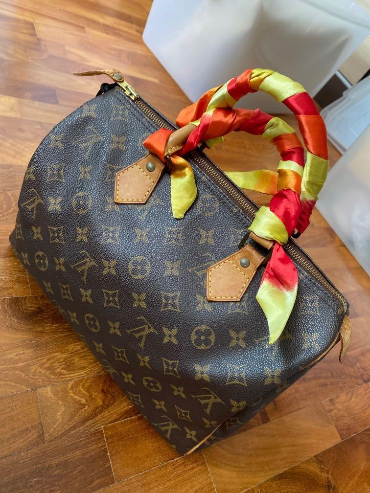 Authentic Louis Vuitton top handle bag in monogram canvas with free twilly