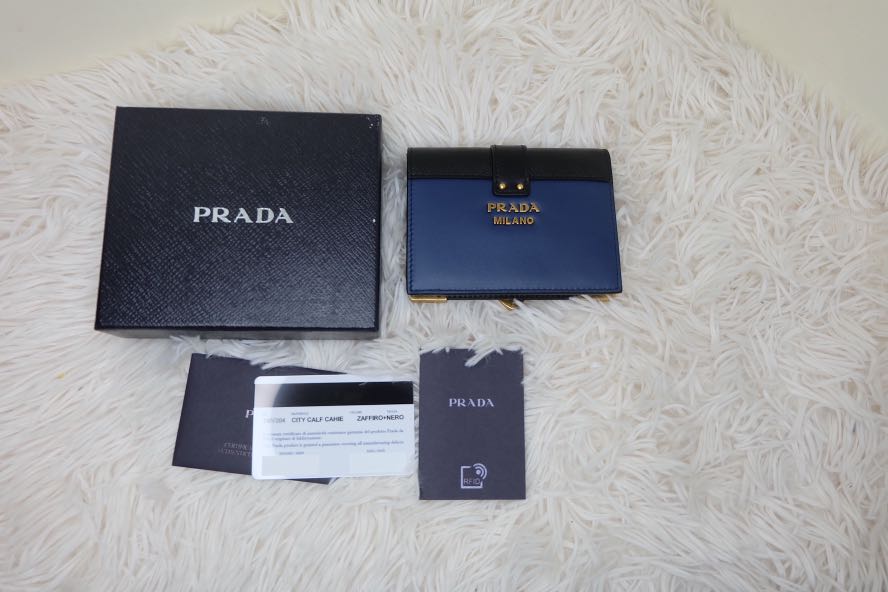 Prada limited edition Bifold wallet, Luxury, Bags & Wallets on Carousell