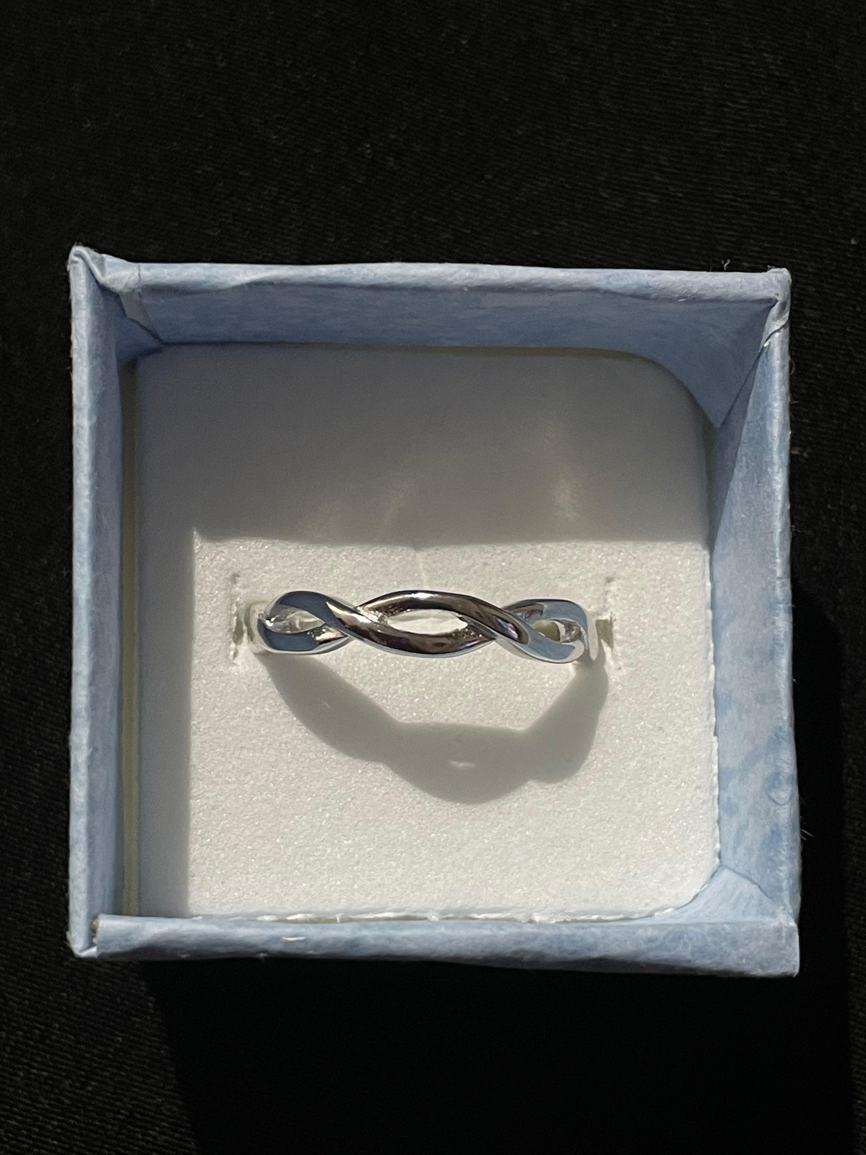 Triple discount infinity ring