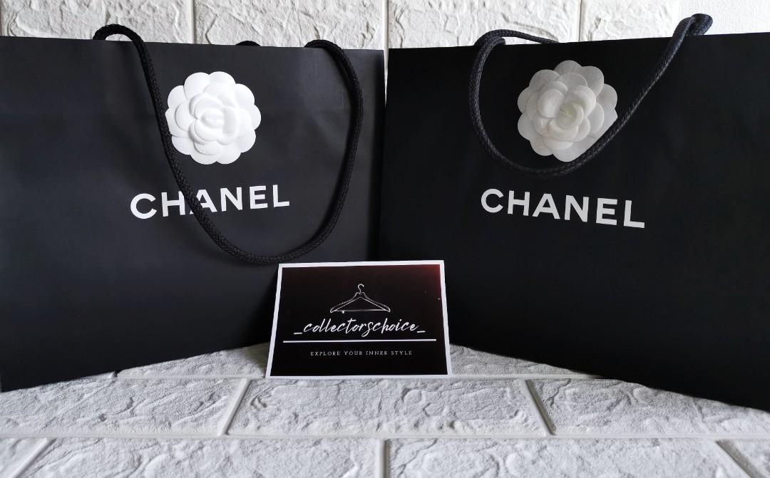 Auth CHANEL paperbag with camellia flower (Category: Luxury Bags & Wallets) located in Makati City. Submitted by _collectorschoice_ (Listing ID 1106010188, Image 1). Description: 1) CHANEL Paperbag with Camellia Flower °💯 Authentic ° Unused ° Height: 13 inches ° Width: 17 inches ° 2 pieces available ° Php 4,000 each 2) CHANEL Paperbag with Camellia Flower 💯 Authentic ° Unused ° Height: 9.5 inches ° Width: 12 inches ° 2 pieces available ° Php 2,