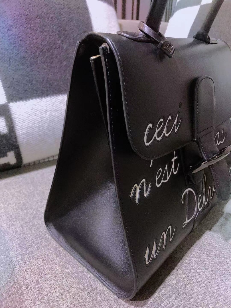 The Brilliant MM Humor This is not a Delvaux Black Leather ref