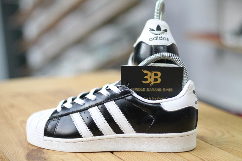 Adidas superstar nigo black hot sale