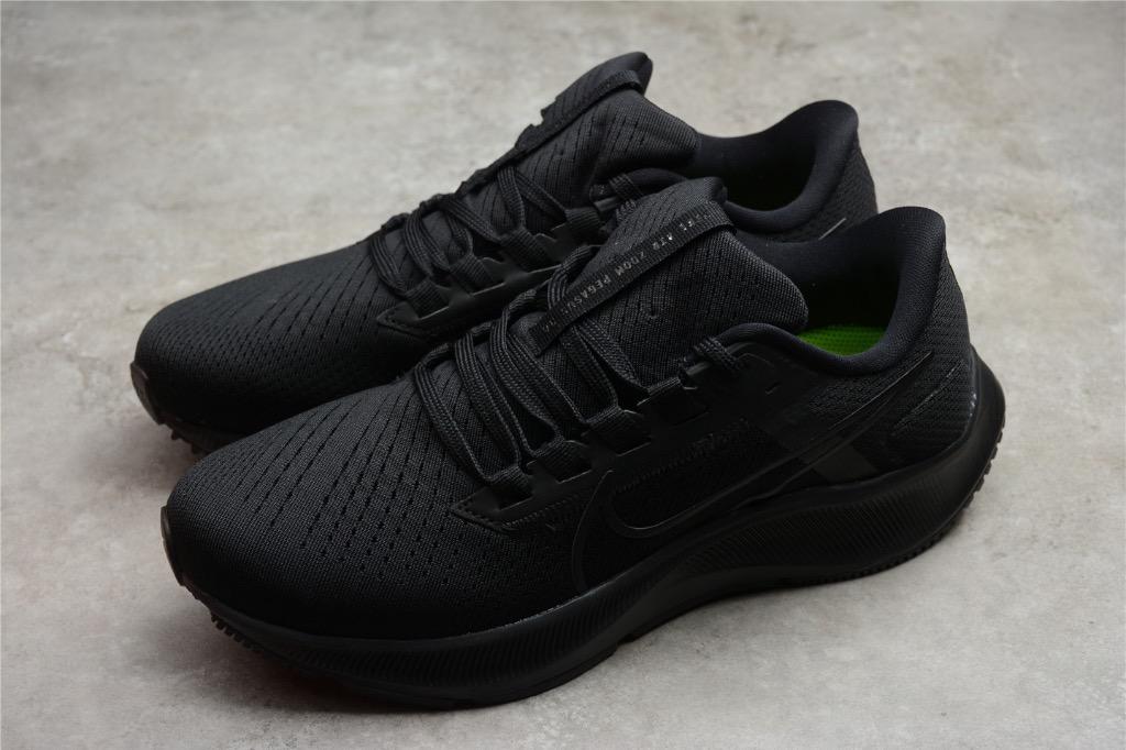 Pure black nike shoes top