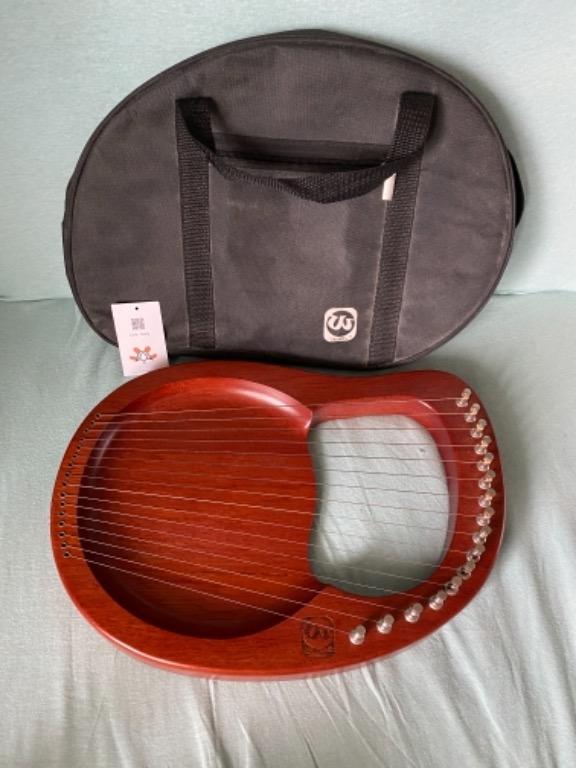 WALTER.t 16-String Wooden Lyre Harp (Category: Musical Instruments) located in Cavite. Submitted by rein0407 (Listing ID 1106022459, Image 1). Description: WALTER 16-string Wooden Lyre Harp The wooden lyre is a string instrument for its use Greek classical antiquity and later periods compact size and lightweight. 16 metal strings design, which can make melodious and bright sound while playing them with your fingers. Mahogany solid wood body with 