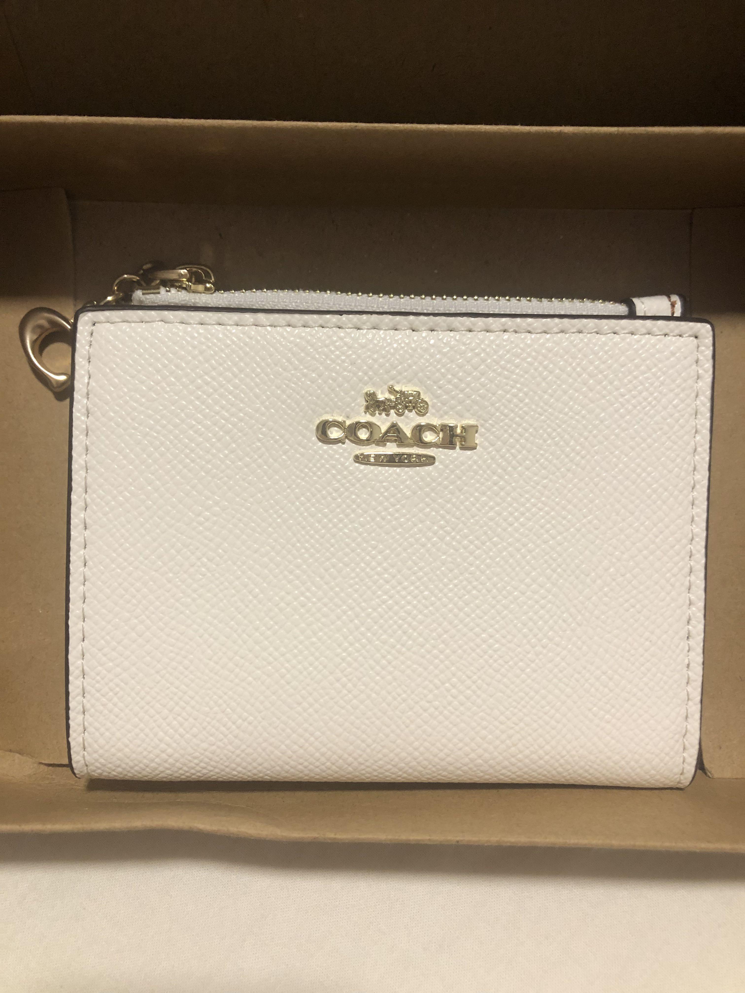 white wallet coach