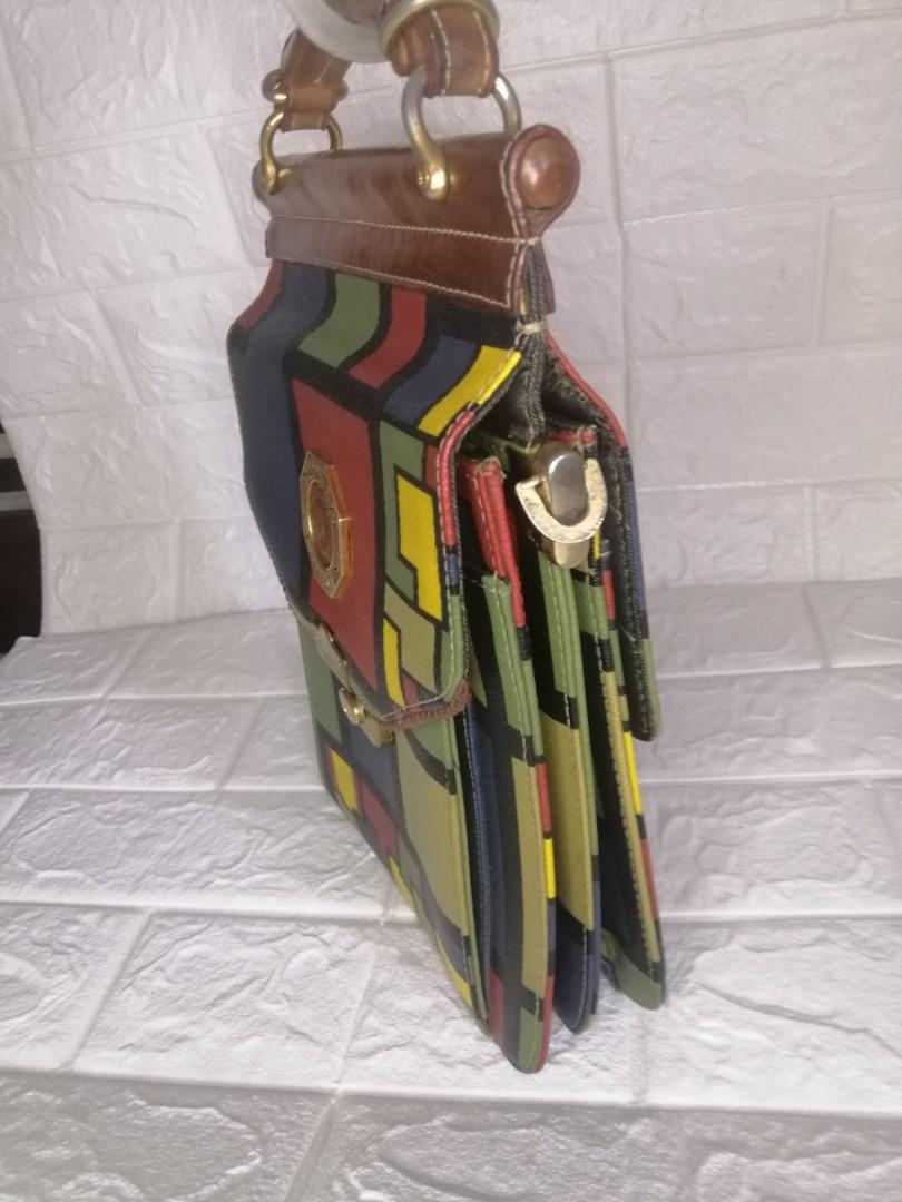 Double Fish Rare Vintage 2-way Bag (Category: Luxury Bags & Wallets) located in Las Pinas. Submitted by etoksi1234 (Listing ID 1112727142, Image 3). Description: Pre-loved Double fish 2-way bag... With provision for sling but no sling included... Some hardware are tarnish... Flaws on the snap botton please see photos for reference... Please manage your expectations. All sales are final. Kindly examine pictures carefully when buying online. No ret