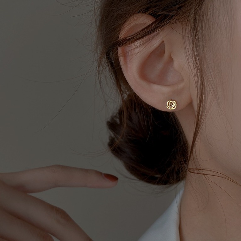 Dainty silver outlet stud earrings