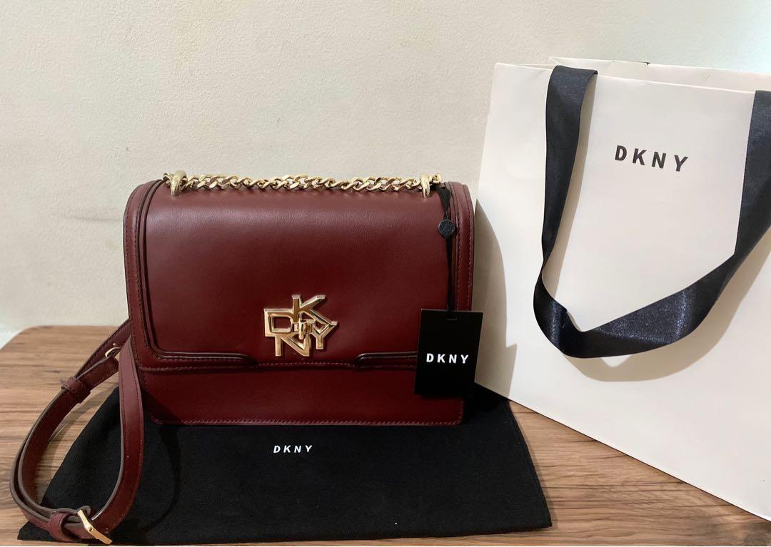 DKNY Crossbody bag (100% authentic with tag) (Category: Luxury Bags & Wallets) located in Taguig. Submitted by ac_shops14 (Listing ID 1113112568, Image 1). Description: Brand new, never used 100% Authentic Original Price is 11,500 (see photo) With tag, paper bag, dust bag Very classy Bought in 2021.