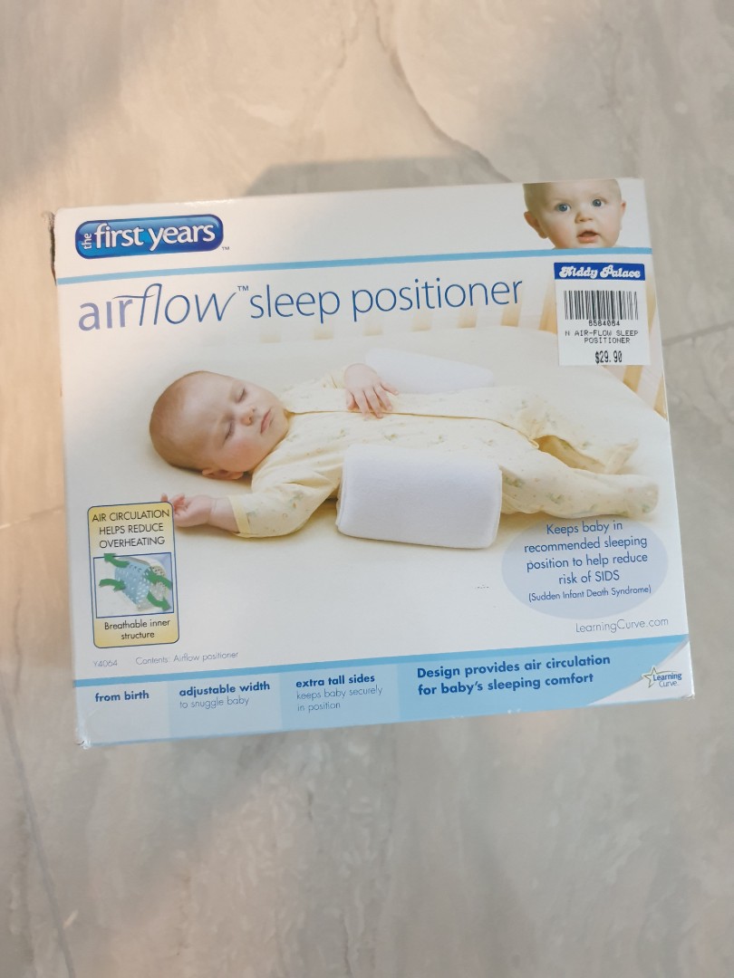first years sleep positioner