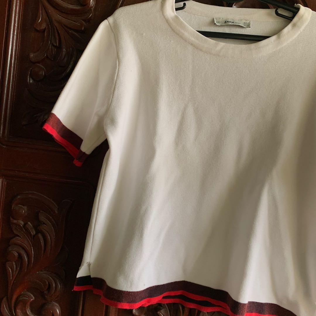 Zara white knit (Category: Blouses) located in Manila. Submitted by marieljayeah (Listing ID 1113302282, Image 3). Description: With minimal flaw, can be seen in the photo.