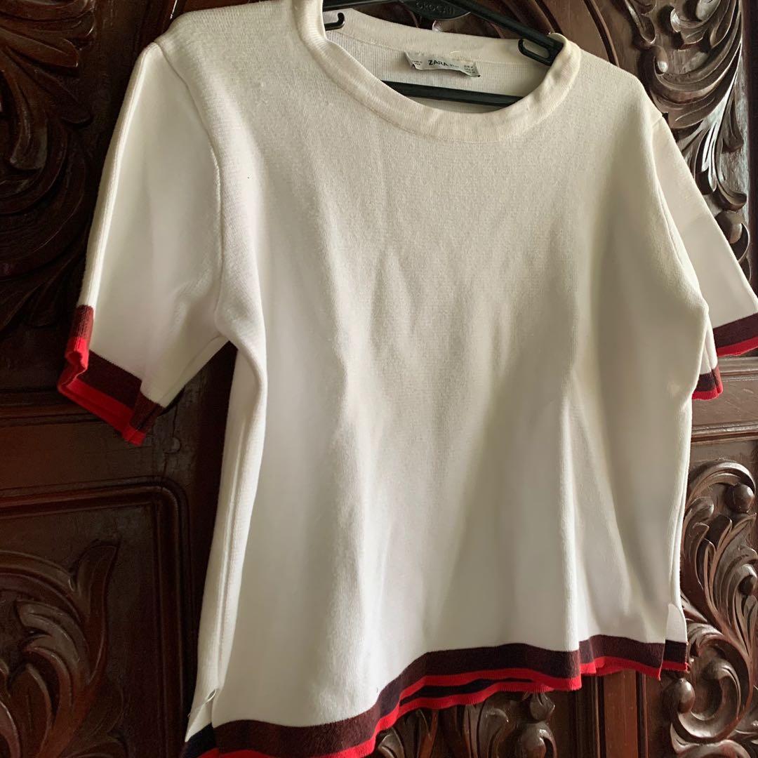 Zara white knit (Category: Blouses) located in Manila. Submitted by marieljayeah (Listing ID 1113302282, Image 2). Description: With minimal flaw, can be seen in the photo.