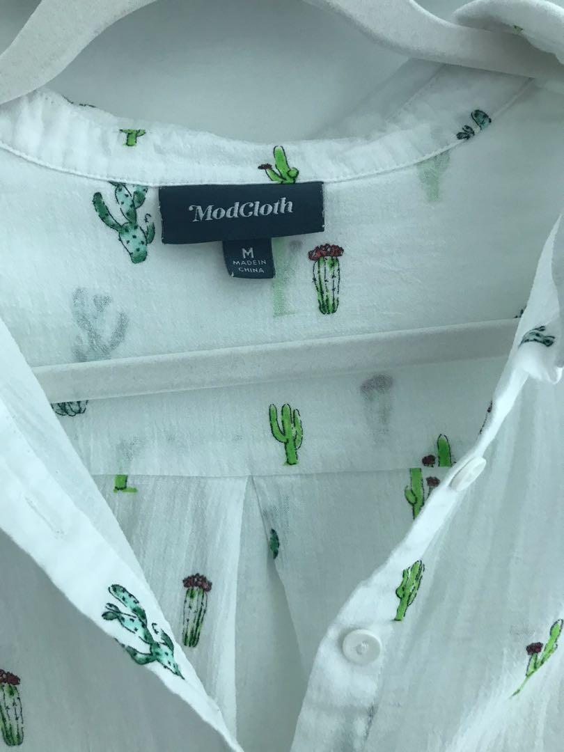 Cactus Button Down (Category: Shirts) located in Singapore. Submitted by jthie407 (Listing ID 1113354742, Image 3). Description: This cute little button down is from ModCloth, still in wearing condition..