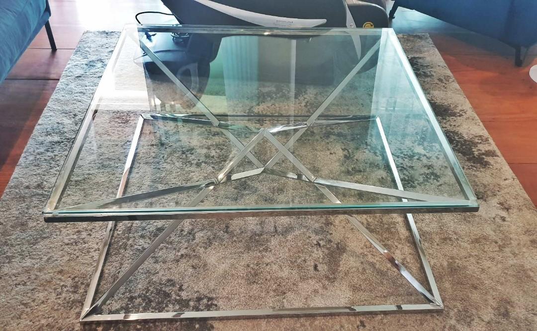 Center Table Modern Glass (Category: Tables & Sets) located in Makati City. Submitted by kace_reyes_09279956969 (Listing ID 1113321226, Image 3). Description: Modern Glass Center Table No dents, damages, or issues 100% condition 42 x 42 x 17.5 inches RFS: Will buy wooden table shipping c/o buyer.