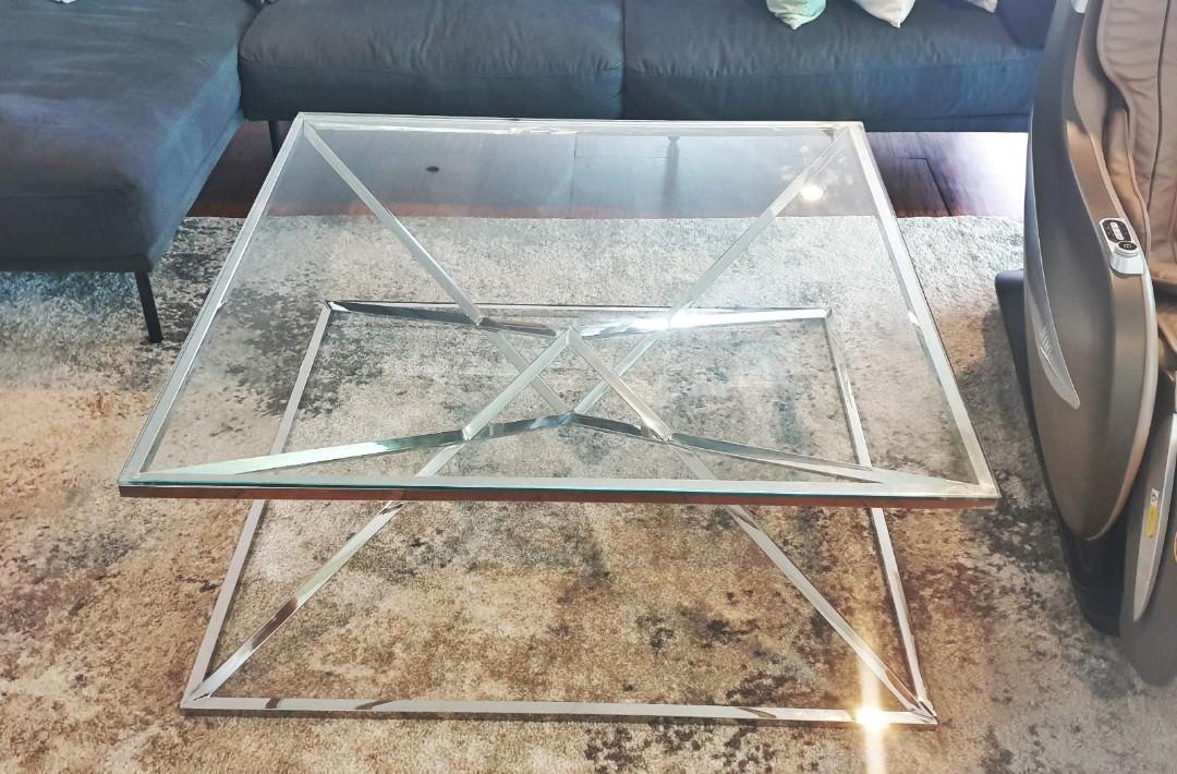 Center Table Modern Glass (Category: Tables & Sets) located in Makati City. Submitted by kace_reyes_09279956969 (Listing ID 1113321226, Image 2). Description: Modern Glass Center Table No dents, damages, or issues 100% condition 42 x 42 x 17.5 inches RFS: Will buy wooden table shipping c/o buyer.