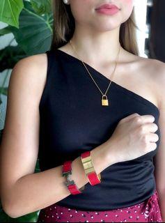 Hermes Loquet Red Bangle Watch. Gold hardware.